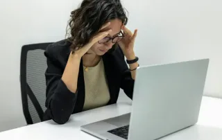 Office worker with a headache